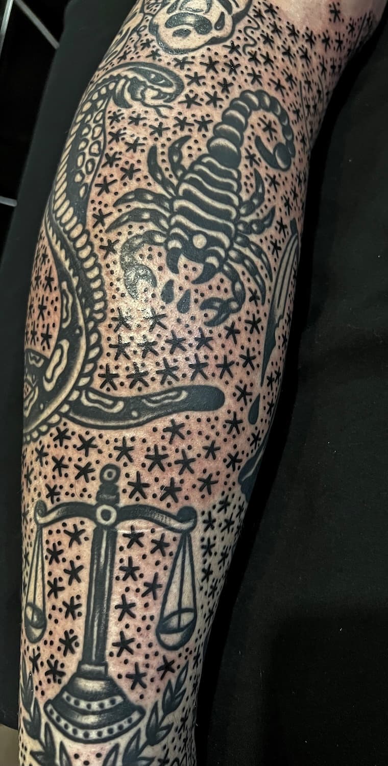 Tattoo of black work on arm