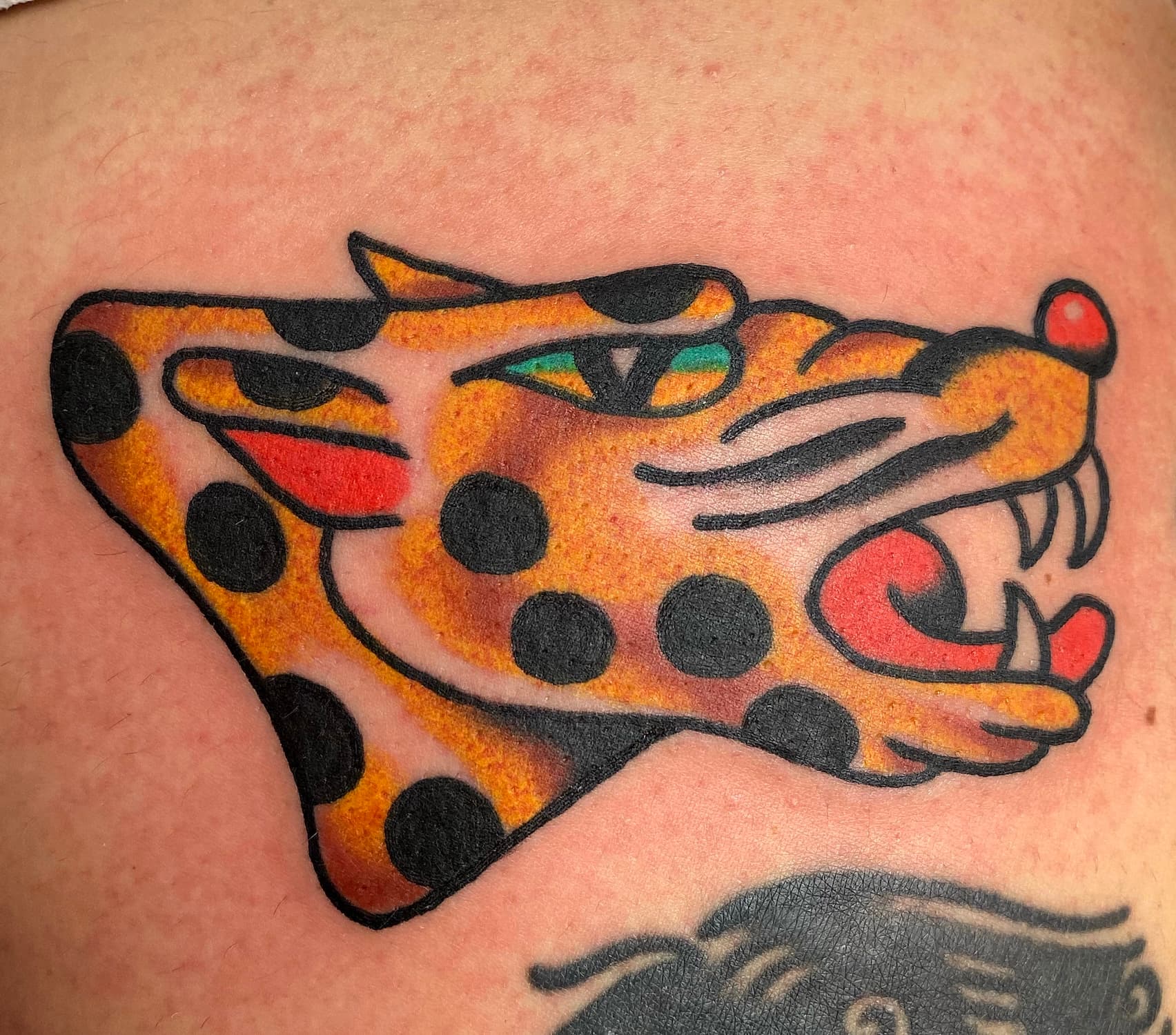 Tattoo of cheetah head