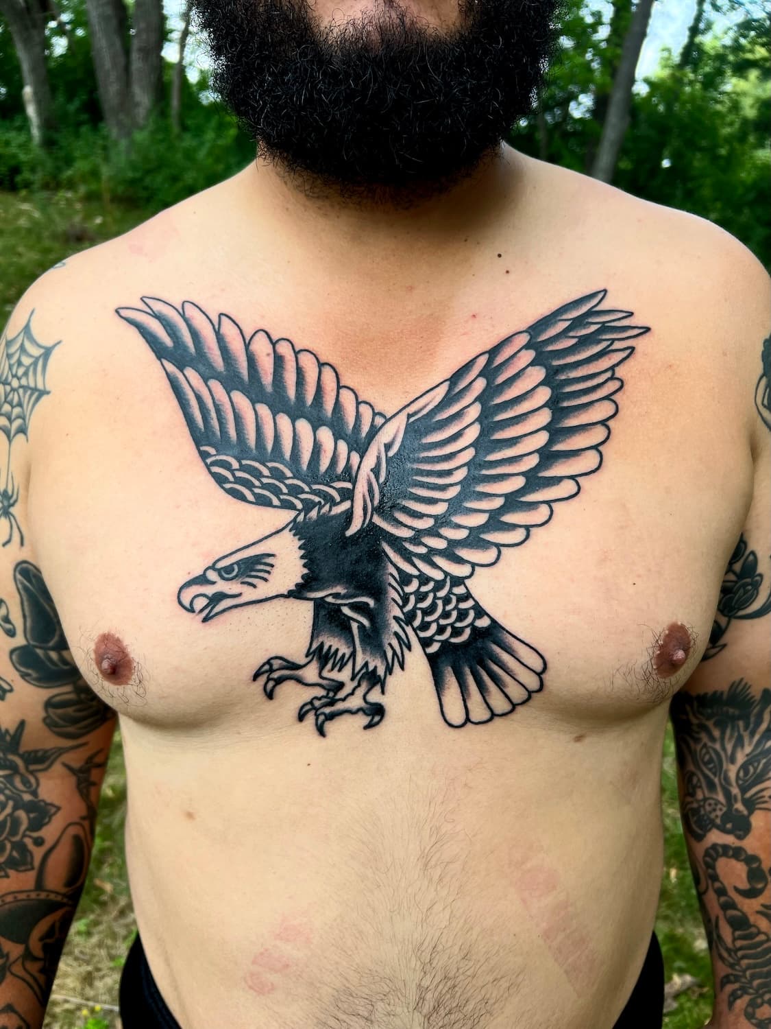 Tattoo of eagle on chest