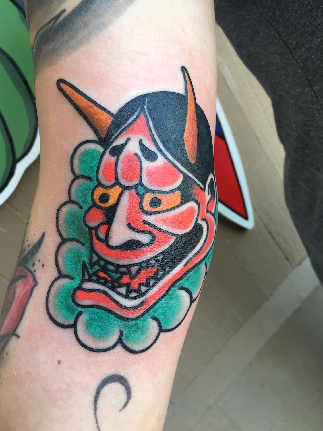 Tattoo of Hannya mask on arm